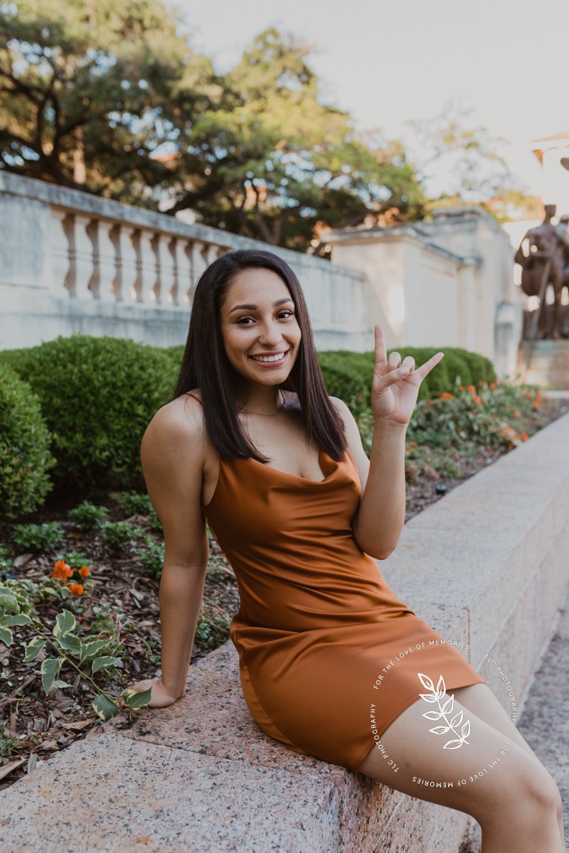 Senior photos next to Littlefield Fountain