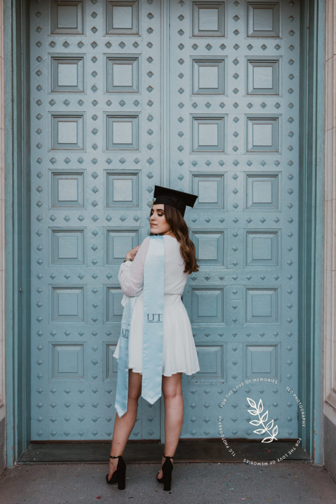 Senior photos in front of the Blue Door