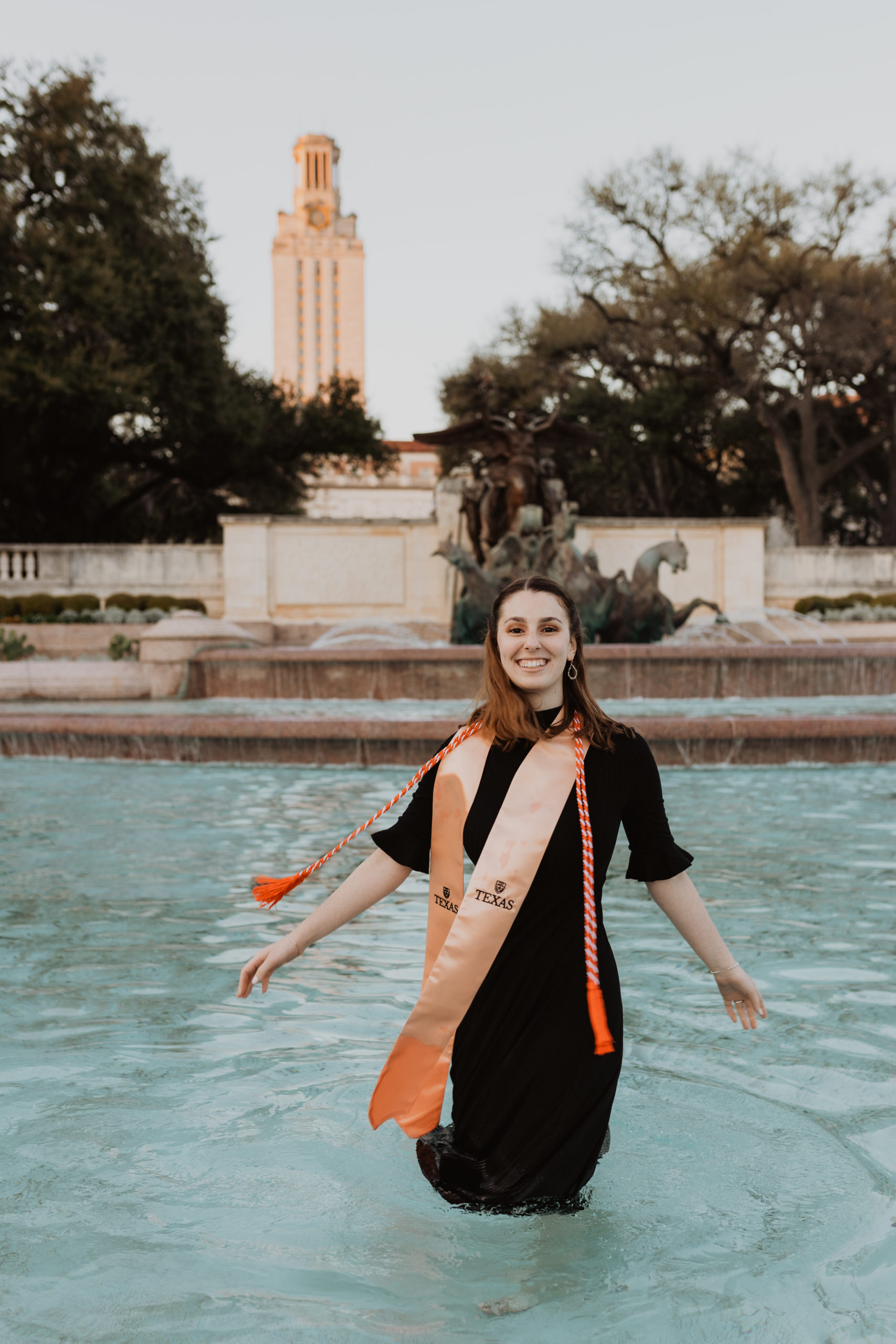 UT Austin senior in Littlefield Fountain